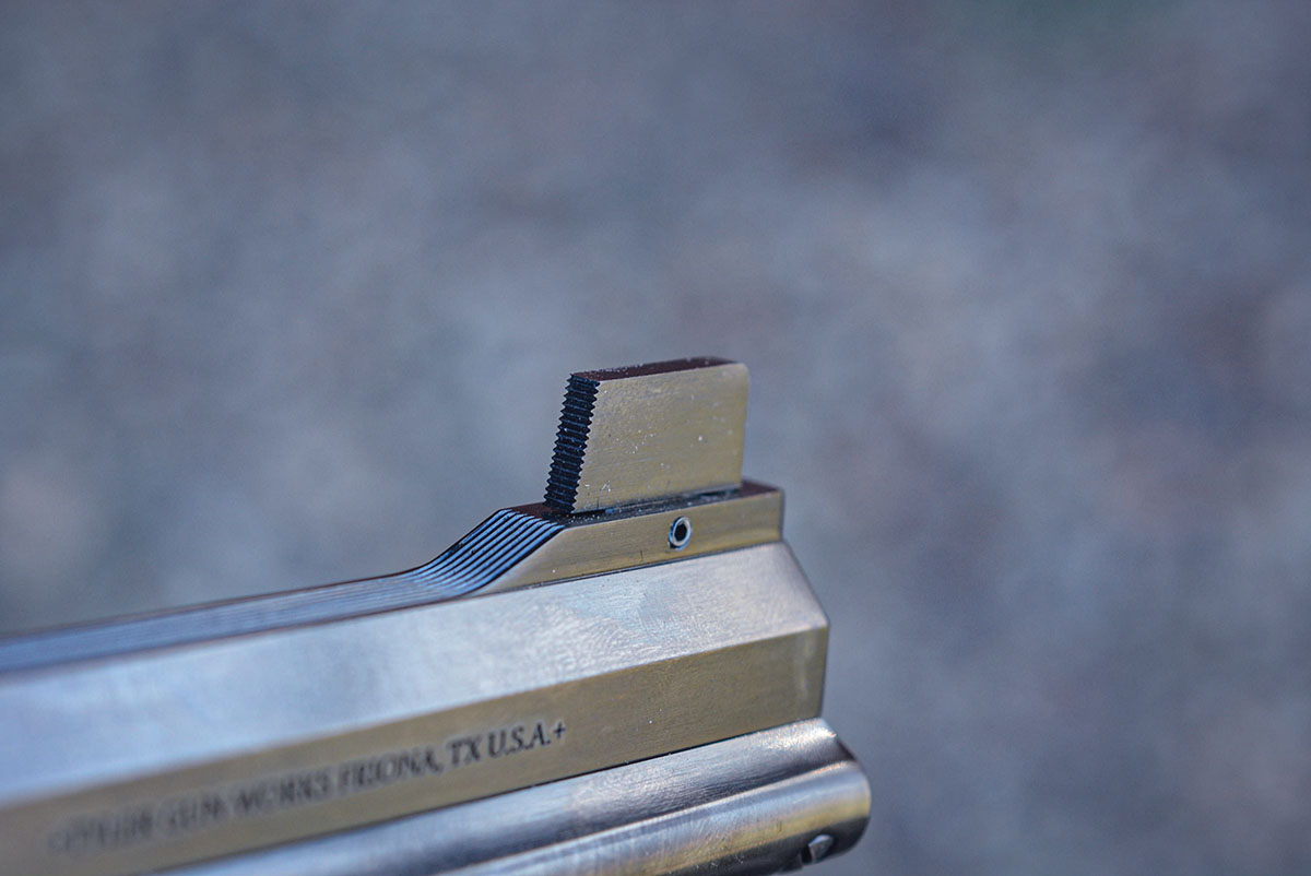 The Brasshawk front sight is semi-Patridge with serrations for a clean sight picture.